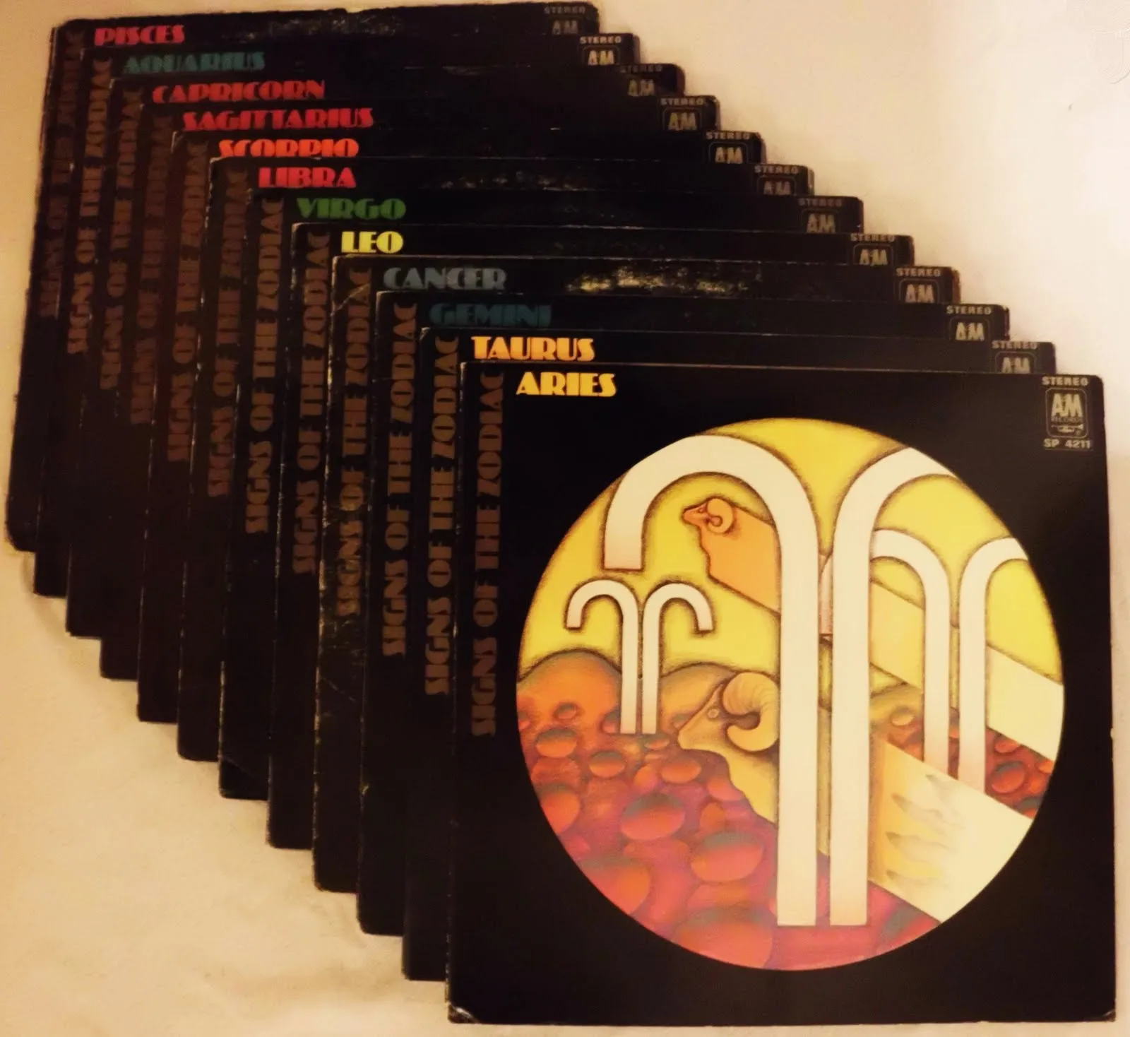 All twelve albums stacked on top of eachother